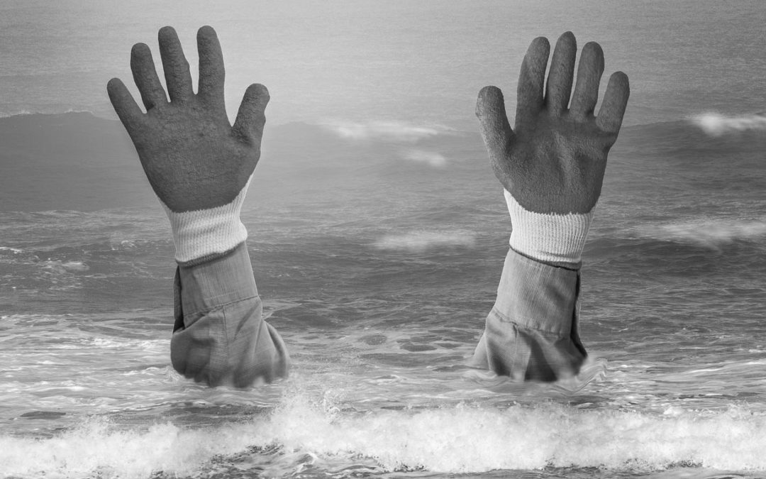 Hands Emerging From Ocean